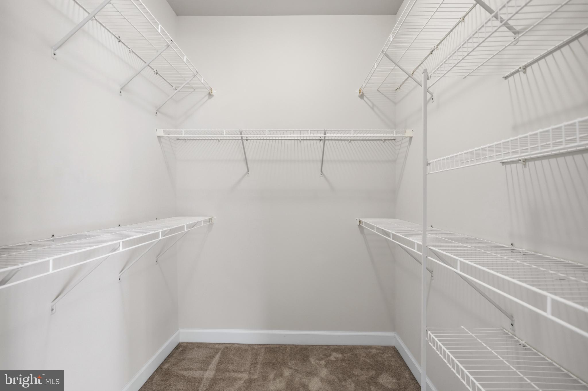 493 Watkins Mill Road Gaithersburg, MD 20878 - Photo 40 of 59 Spacious, organized closet ready for use.