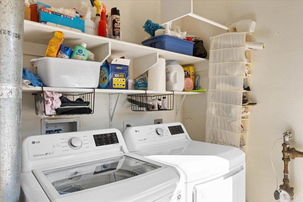 3069 West Canyon Avenue San Diego, CA 92123 - Photo 25 of 37 a utility room with dryer and washer