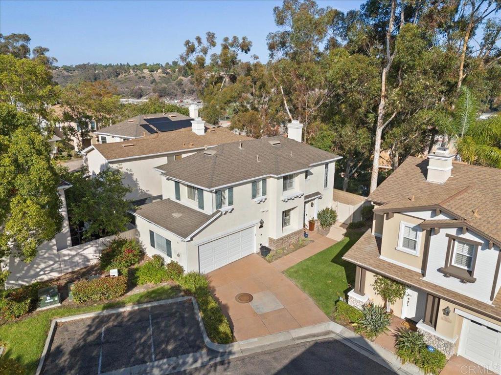 3069 West Canyon Avenue San Diego, CA 92123 - Photo 27 of 37 an aerial view of a house with a yard