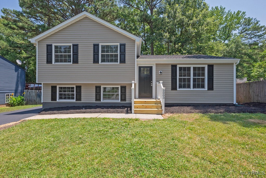 5003 Meredith Woods Road Glen Allen, VA 23060 - Photo 1 of 36 a front view of a house with a yard and garage