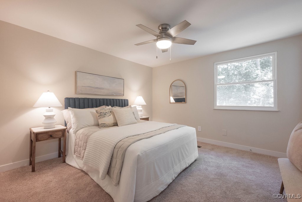 5003 Meredith Woods Road Glen Allen, VA 23060 - Photo 20 of 36 a bedroom with a bed and a window