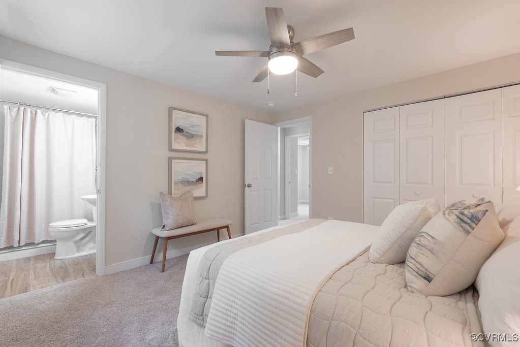 5003 Meredith Woods Road Glen Allen, VA 23060 - Photo 22 of 36 a bedroom with a bed and a chandelier