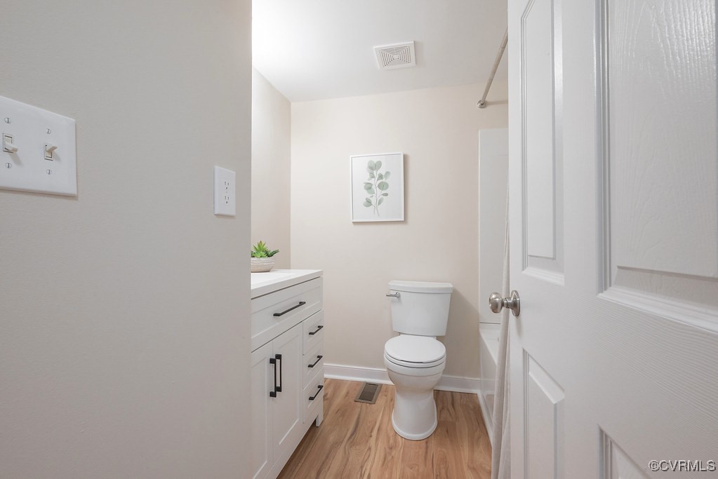 5003 Meredith Woods Road Glen Allen, VA 23060 - Photo 28 of 36 a white toilet sitting next to a shower curtain