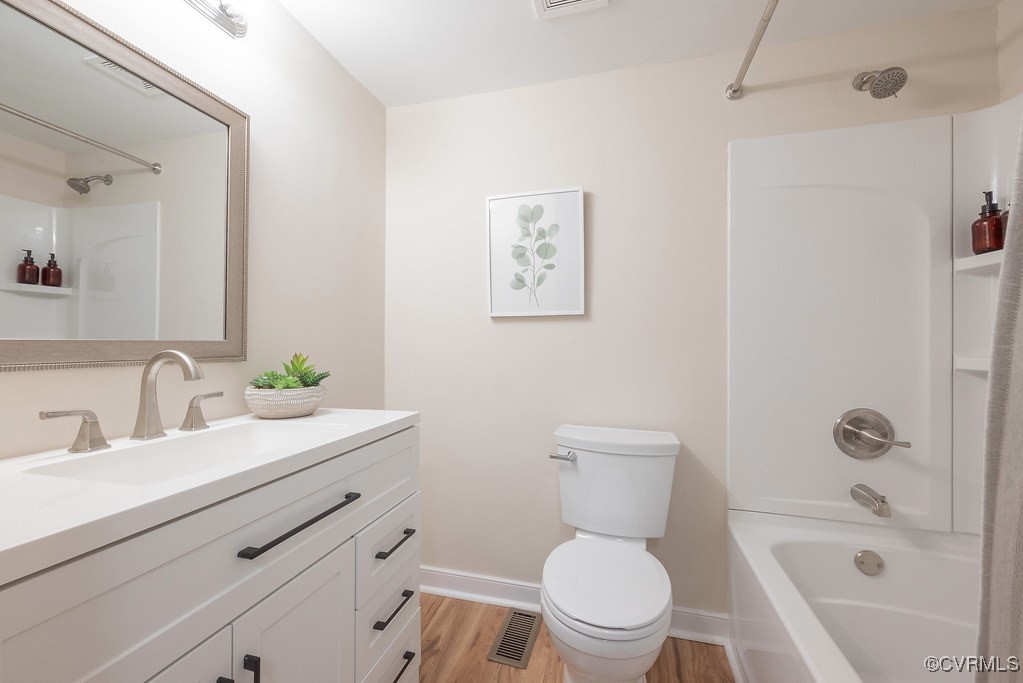 5003 Meredith Woods Road Glen Allen, VA 23060 - Photo 29 of 36 a bathroom with a sink a toilet and shower