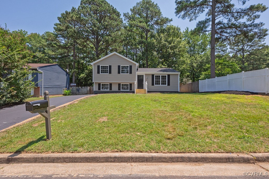 5003 Meredith Woods Road Glen Allen, VA 23060 - Photo 34 of 36 a front view of a house with garden