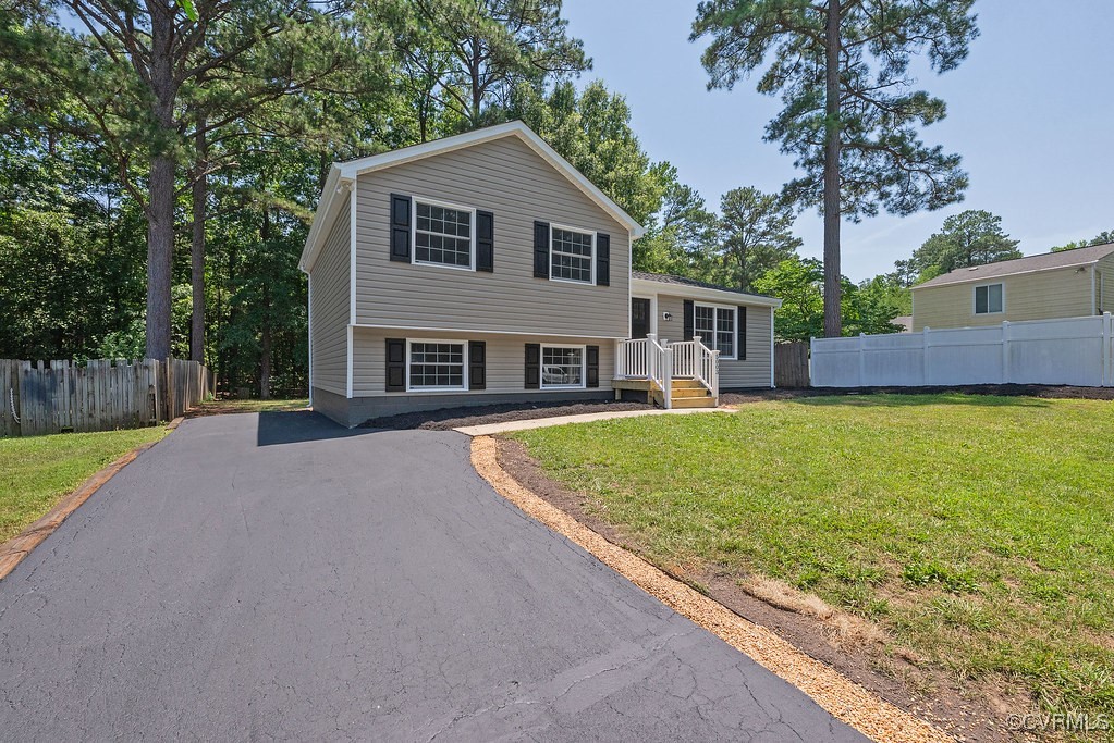 5003 Meredith Woods Road Glen Allen, VA 23060 - Photo 35 of 36 a front view of a house with garden
