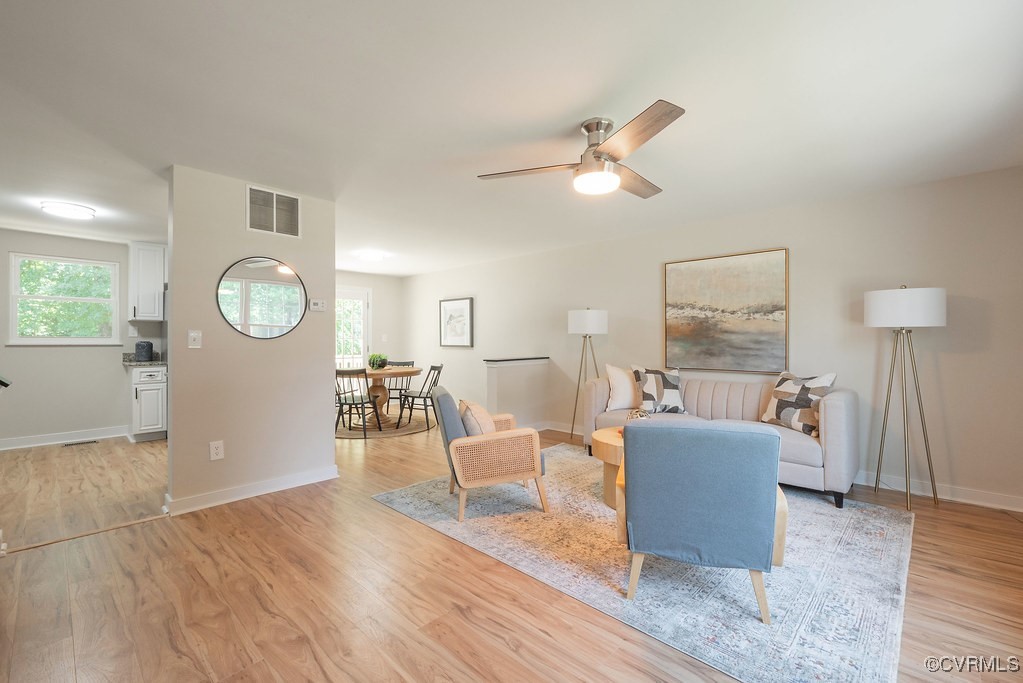 5003 Meredith Woods Road Glen Allen, VA 23060 - Photo 10 of 36 a living room with furniture a window and wooden floor