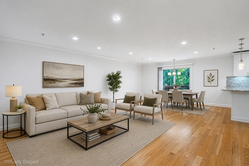 215 Rangeway Road, Unit 31 Billerica, MA 01862 - Photo 11 of 40 a living room with furniture and wooden floor