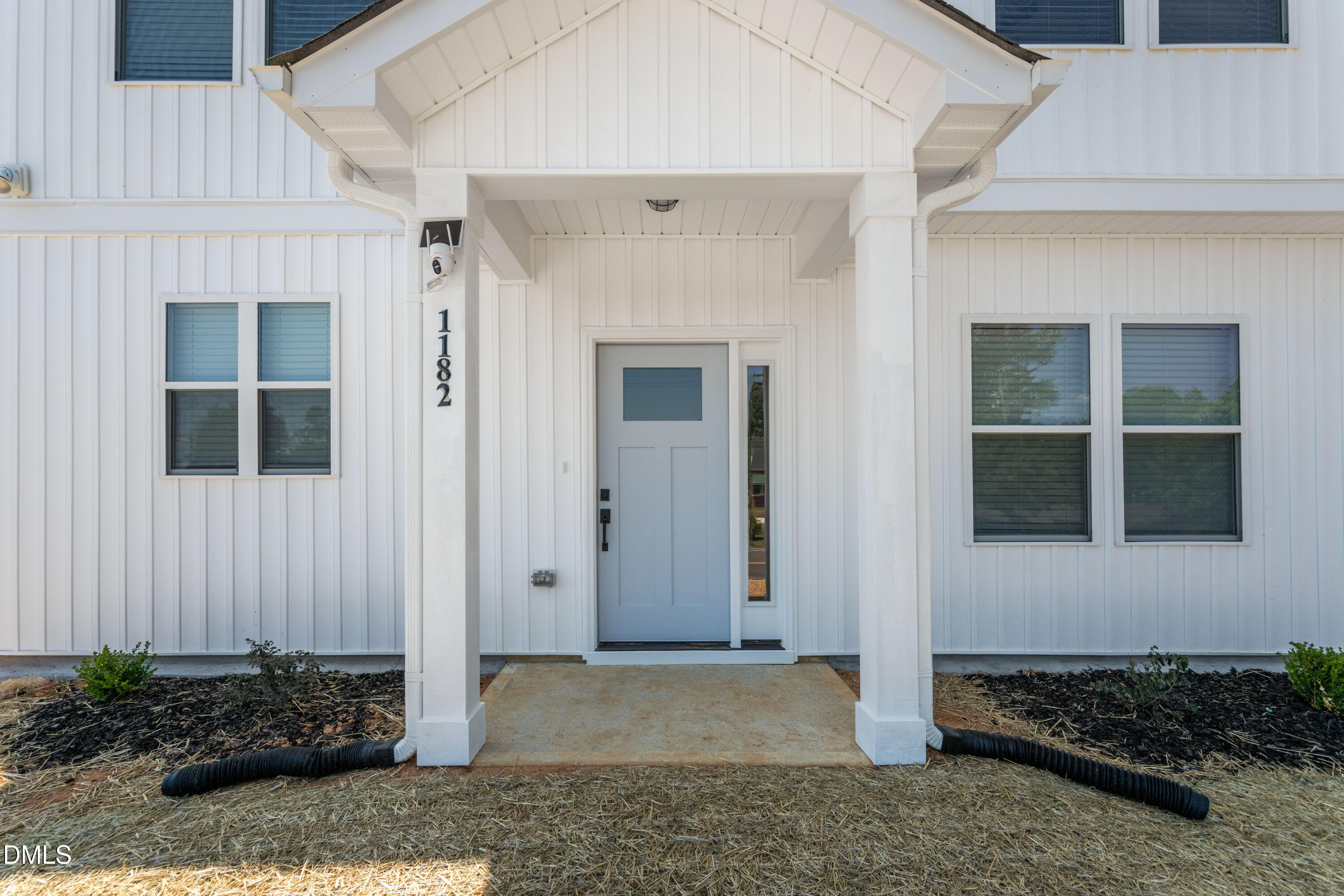 1182 Hurdle Mills Road Roxboro, NC 27573 - Photo 6 of 45 a view of a house with a backyard