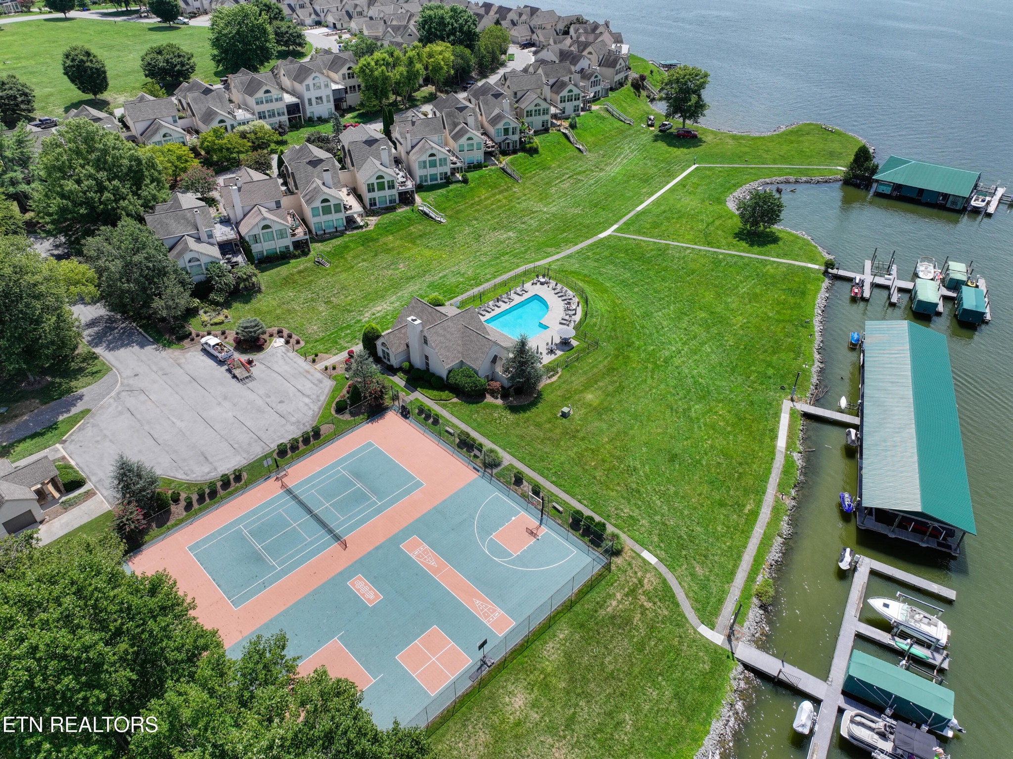 3417 Commodore Point Knoxville, TN 37922 - Photo 29 of 31 an aerial view of a tennis ground and a cars park