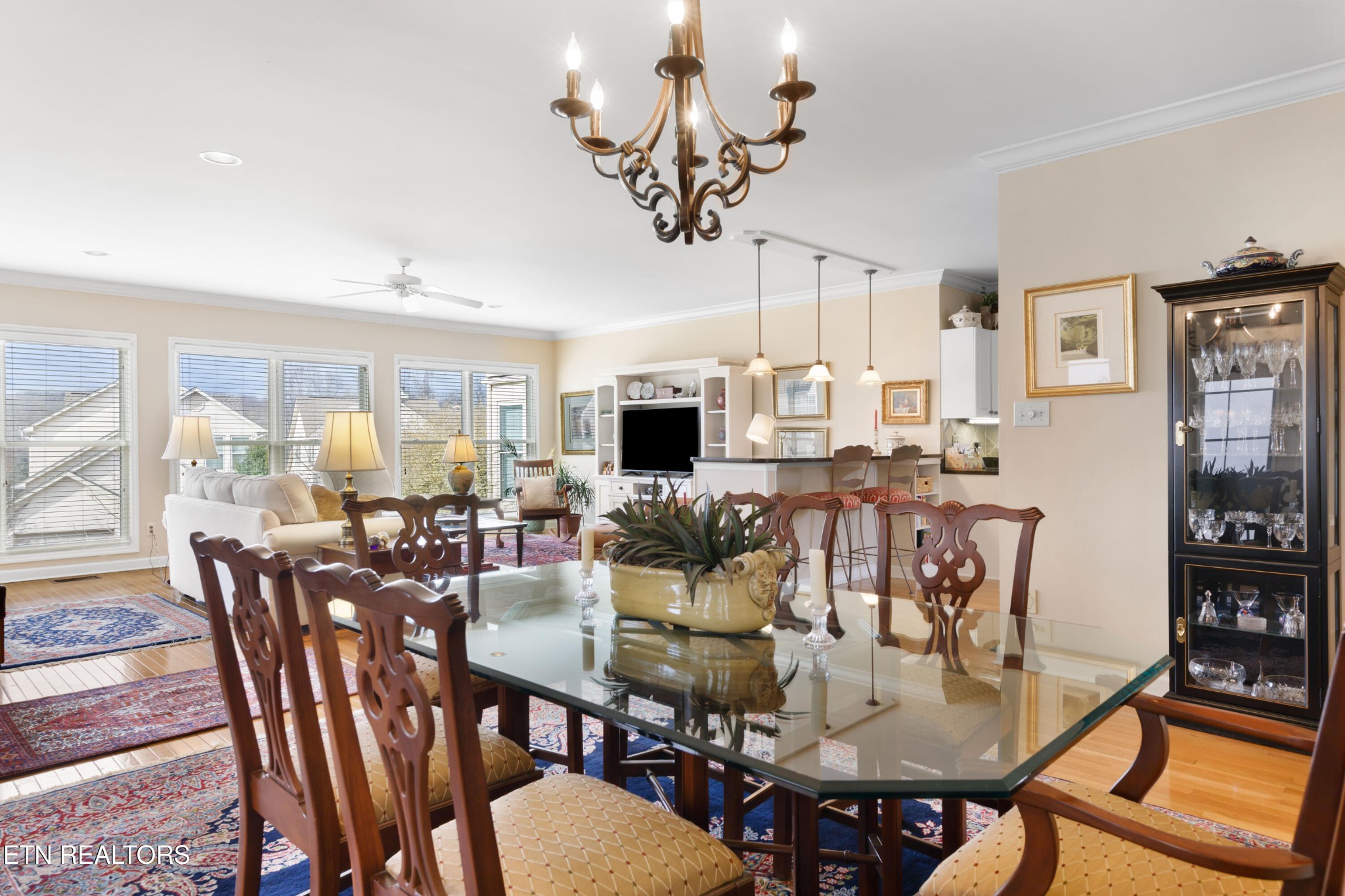 3417 Commodore Point Knoxville, TN 37922 - Photo 10 of 31 a view of a dining room with furniture a chandelier and wooden floor