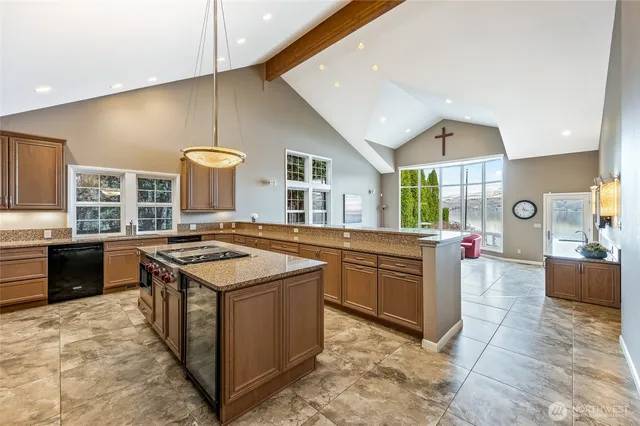 a bathroom with a shower and a sink