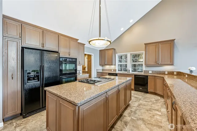a view of livingroom with furniture and floor to ceiling window