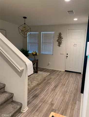 a kitchen with a stove and a microwave