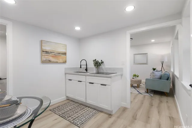a spacious bathroom with a double vanity sink and a mirror