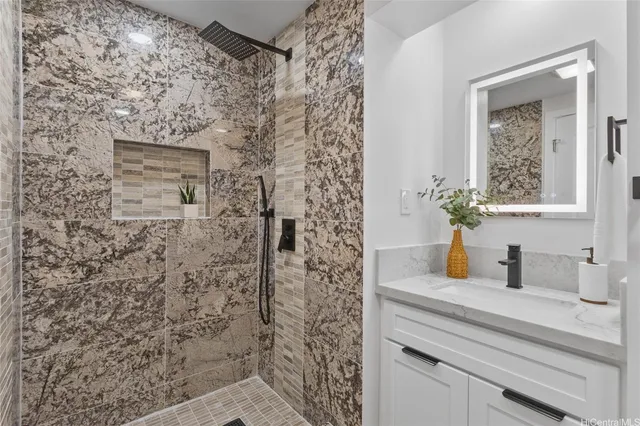 a bathroom with a sink and a mirror