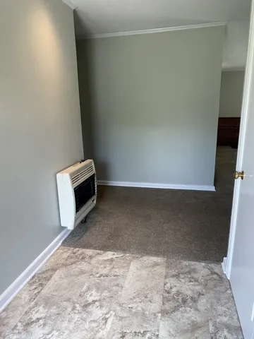 a view of a storage & utility room with a sink