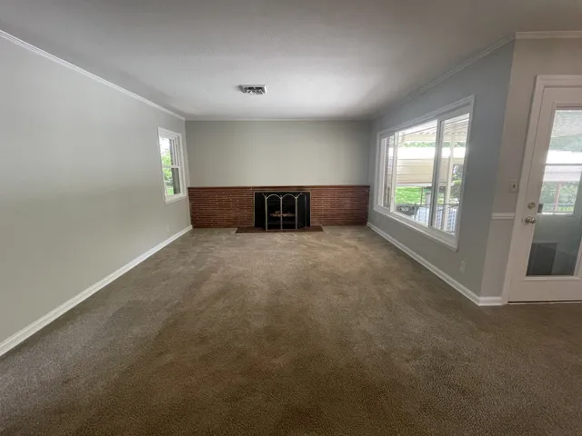 an empty room with windows