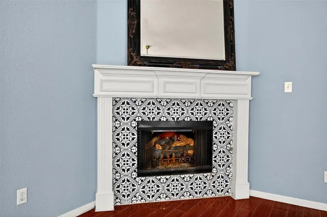 a fireplace with a clock on top of it