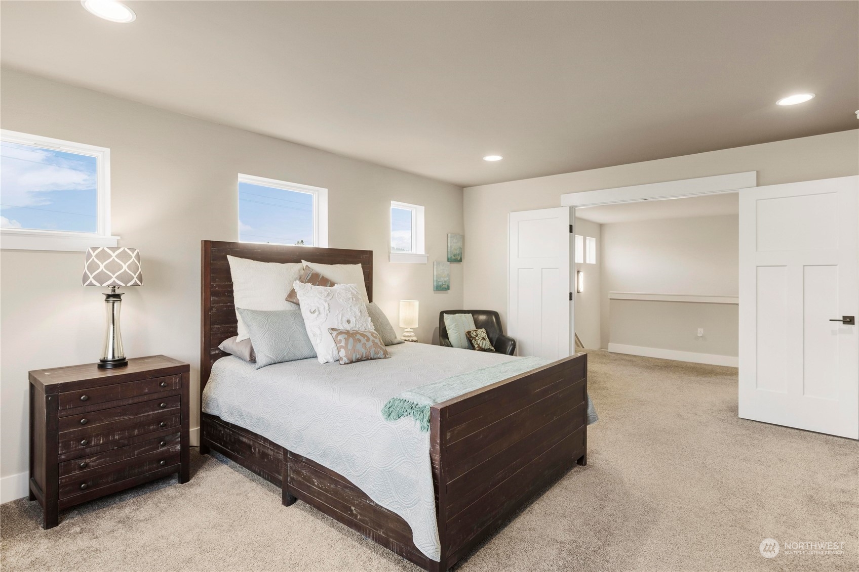 111 Love Drive Enumclaw, WA 98022 - Photo 17 of 34 a bedroom with a bed and a night stand