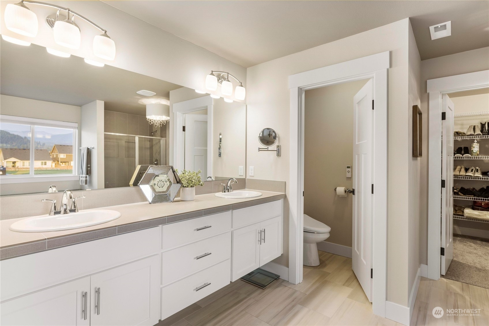 111 Love Drive Enumclaw, WA 98022 - Photo 19 of 34 a bathroom with a granite countertop sink mirror and a toilet