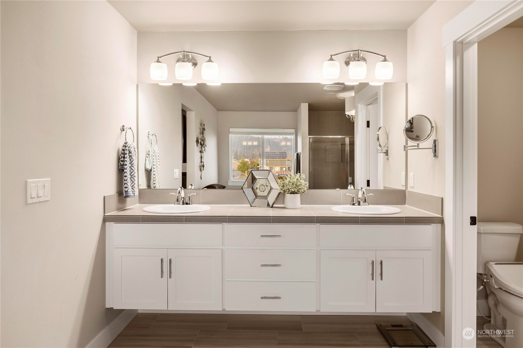 111 Love Drive Enumclaw, WA 98022 - Photo 20 of 34 a bathroom with a sink and a mirror