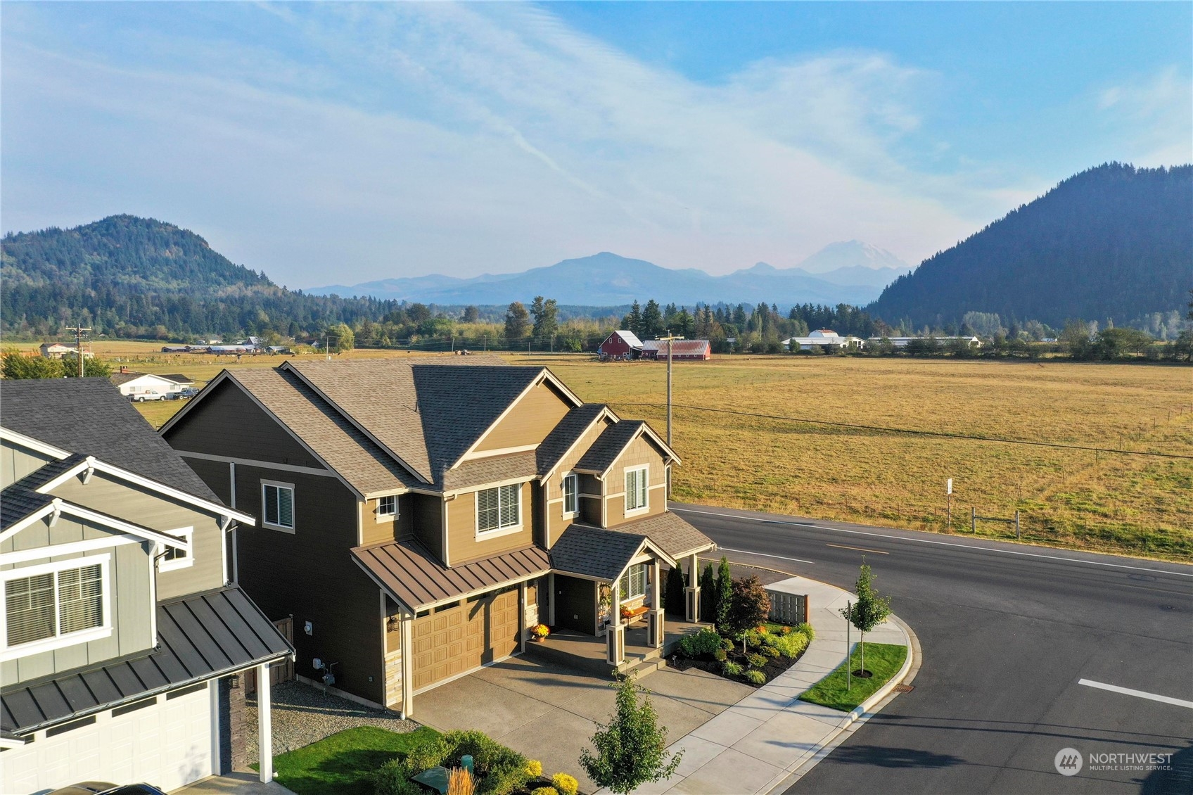 111 Love Drive Enumclaw, WA 98022 - Photo 32 of 34 an aerial view of a house with a ocean view