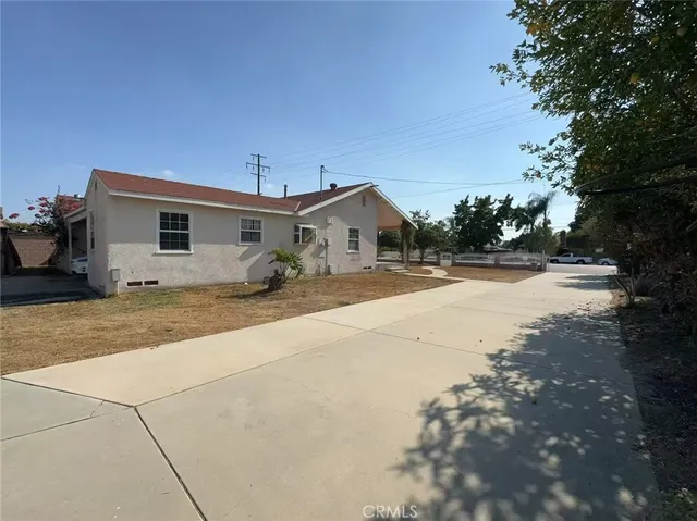 a bathroom with a double vanity sink and mirror