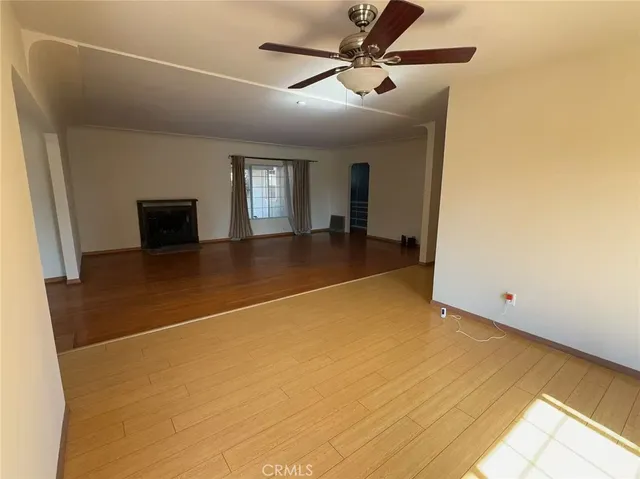 a view of an empty room and window