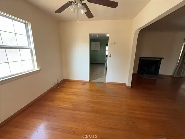 a bathroom with a granite countertop toilet a sink and bathtub