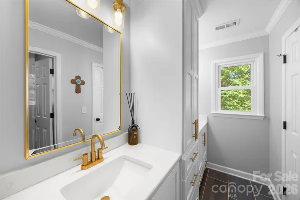 a bathroom with a sink and a bathtub