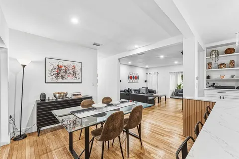a view of a dining room with furniture