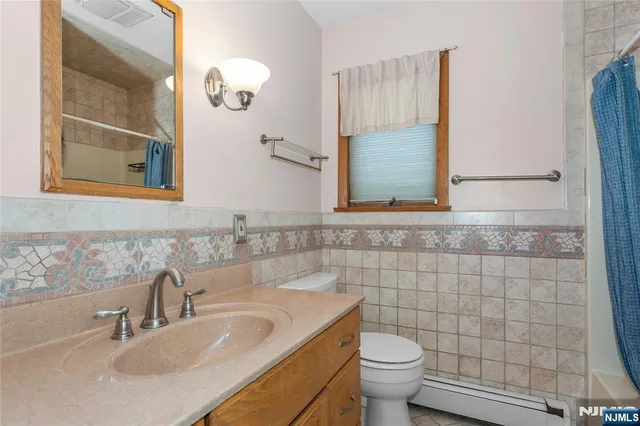 a bathroom with a sink and a toilet