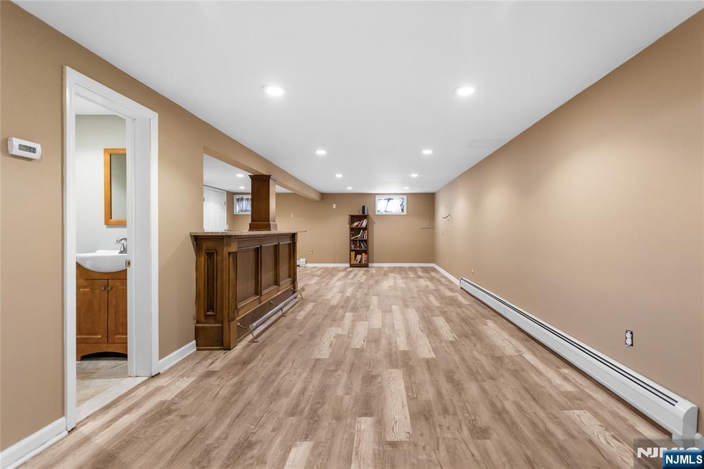 86 Reservoir Avenue Butler, NJ 07405 - Photo 19 of 32 a view of empty room with wooden floor