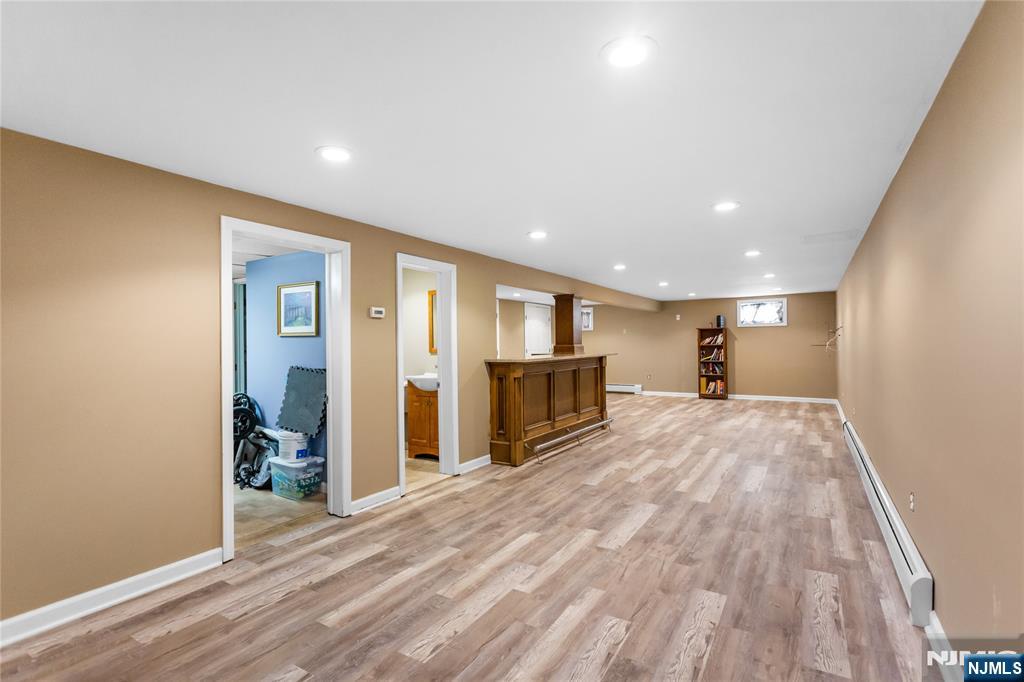 86 Reservoir Avenue Butler, NJ 07405 - Photo 20 of 32 a view of empty room with wooden floor