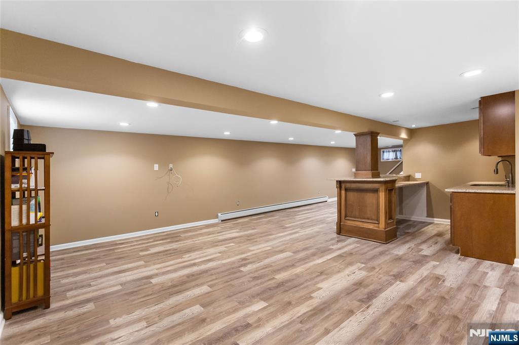 86 Reservoir Avenue Butler, NJ 07405 - Photo 21 of 32 a view of a room with wooden floor