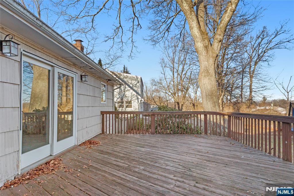 86 Reservoir Avenue Butler, NJ 07405 - Photo 26 of 32 a view of a wooden deck