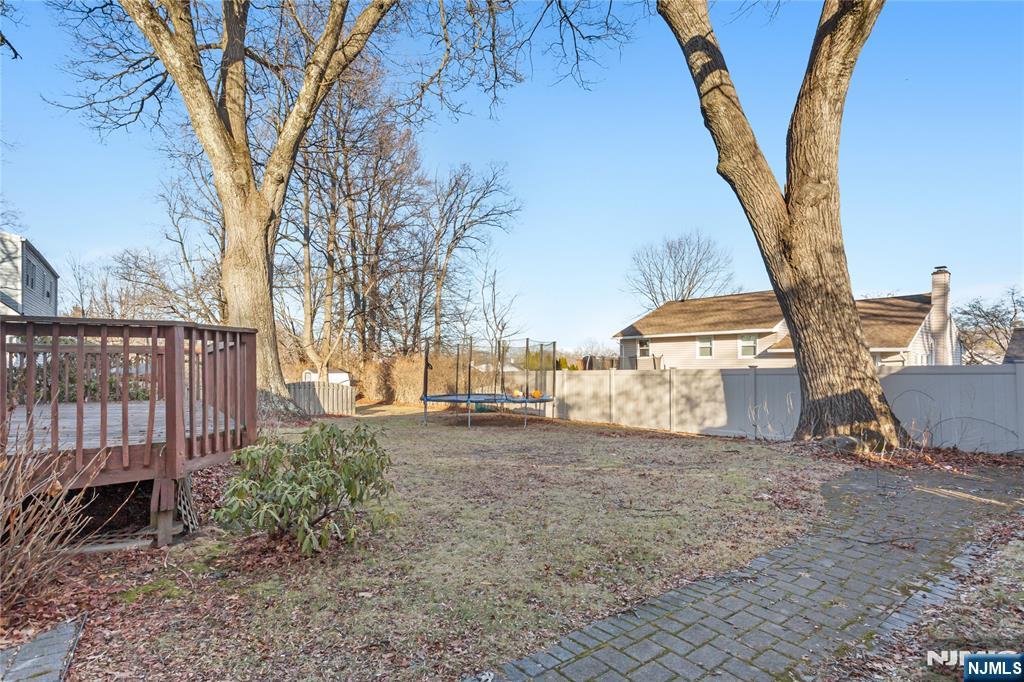 86 Reservoir Avenue Butler, NJ 07405 - Photo 31 of 32 a view of a trees in front of a house
