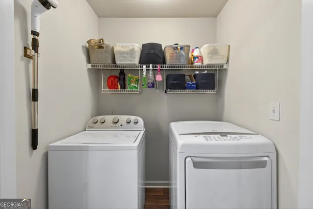a utility room with dryer and washer