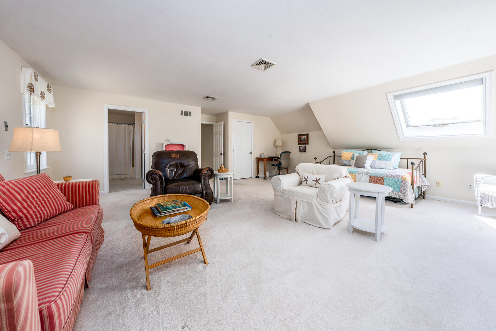 42 Eventide Lane Hyannis, MA 02601 - Photo 25 of 39 a living room with furniture and a lamp