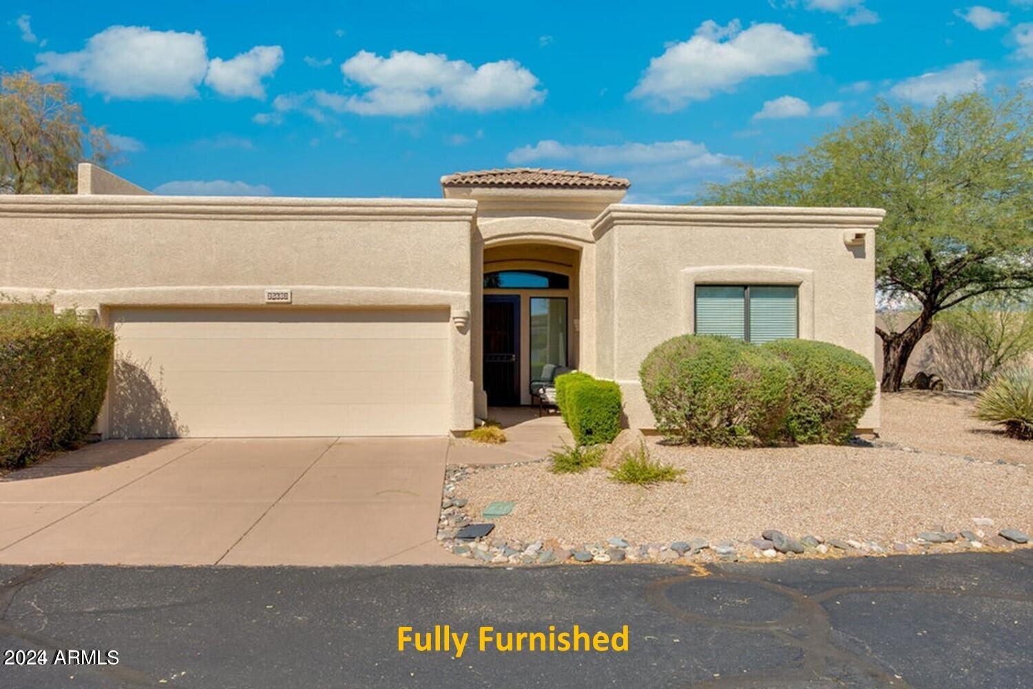 25603 North Sago Drive Rio Verde, AZ 85263 - Photo 1 of 25 a view of backyard of house