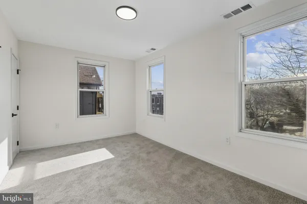 an empty room with windows