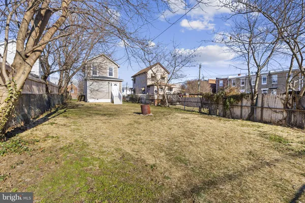 a view of large house with a outdoor space