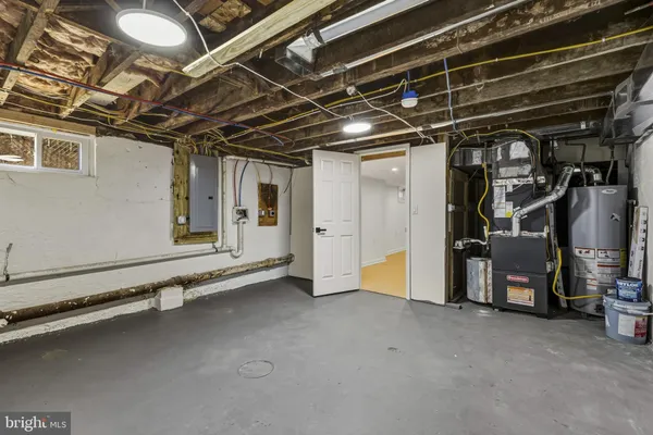 a view of an empty room with storage