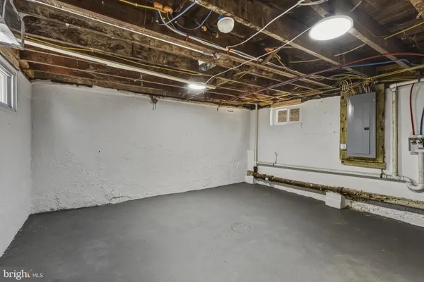 a view of a room with wooden walls