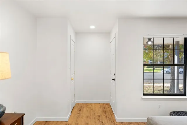 a view of hallway with windows