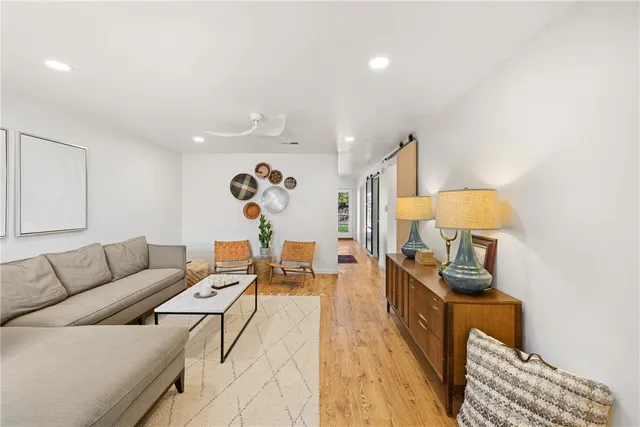 a living room with furniture and a couch