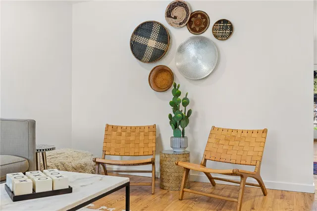 a picture of a table and a chair with wooden floor