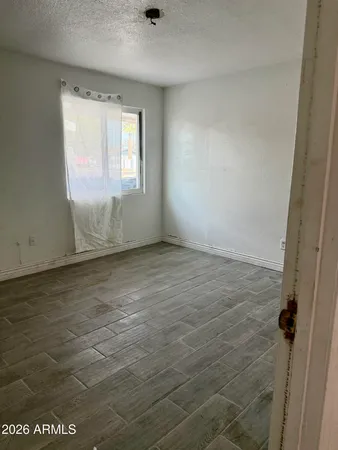 an empty room with windows