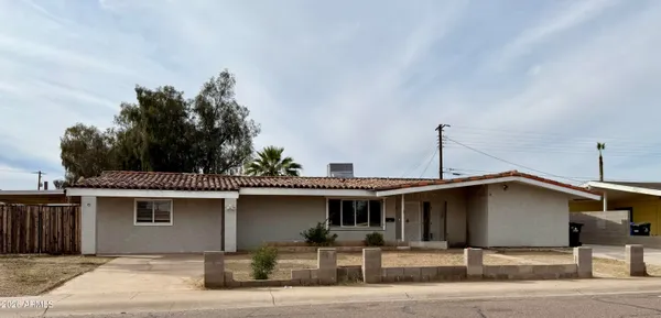 a front view of a house with a porch
